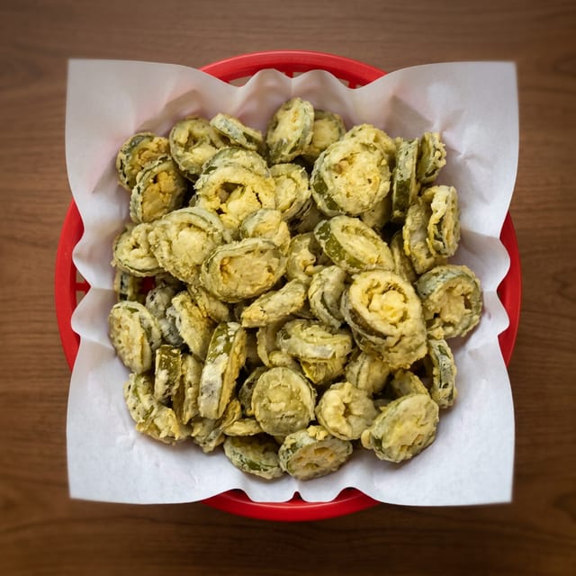 #76 FRIED JALAPENO CAPS.